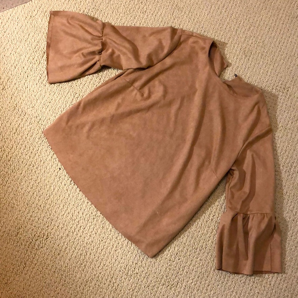 Faux suede shirt with bell sleeves.